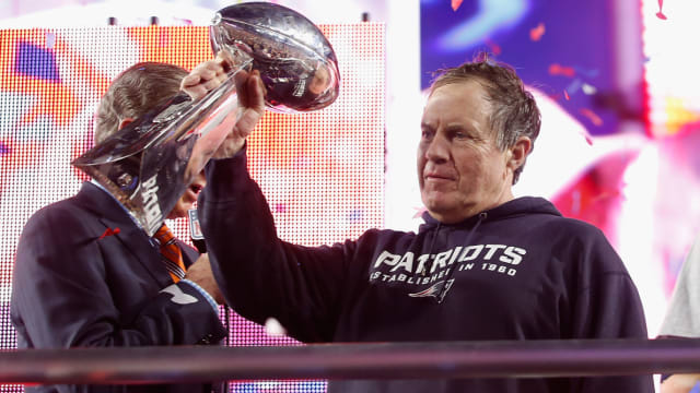New England Patriots coach Bill Belichick celebrates a Super Bowl victory.